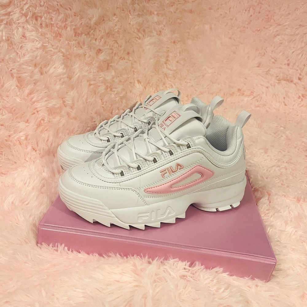 Size Woman’s 7 white and pink Fila Disruptor Sneakers.
